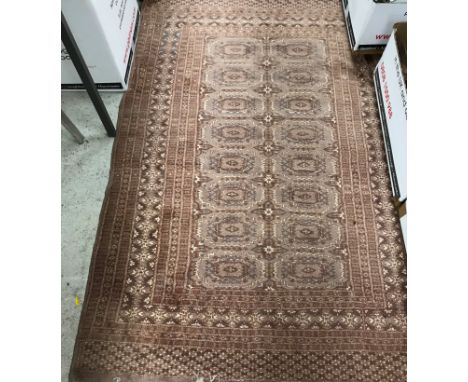 A Belouch Afghan rug, the central panel set with stylised architectural / temple and foliate motifs on a blue ground, within 