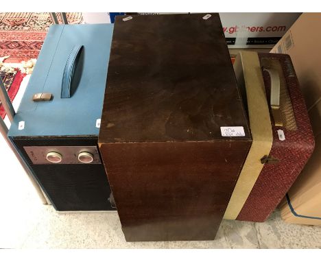 An Ultra Monarch portable record player, an Invicta wooden cased radio and a Westminster portable record player