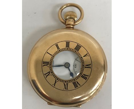 A 9 carat gold cased half hunter pocket watch, the white enamel dial set with Roman numerals and secondary dial and inscribed