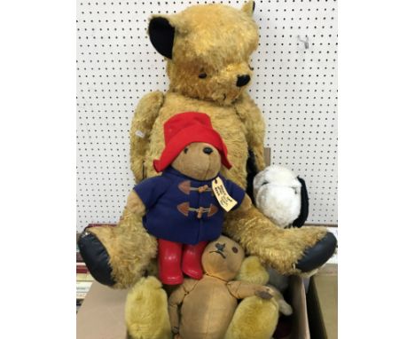 A collection of various early 20th Century and later soft toys / teddy bears including Sri Lankan Paddington Bear, large gold