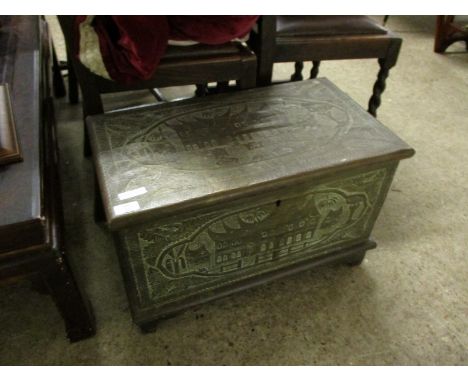 EASTERN BRASS MOUNTED SMALL PROPORTION TRUNK WITH IMPRESSED SCENES THROUGHOUT AND FITTED CANDLE BOX 