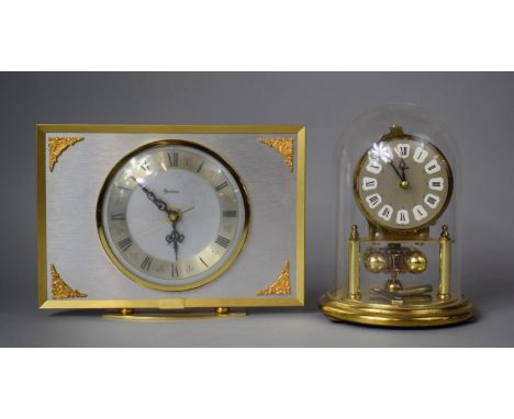 A Bentima Battery Operated Mantel Clock and a Kundo Pillar Clock under Plastic Dome 
