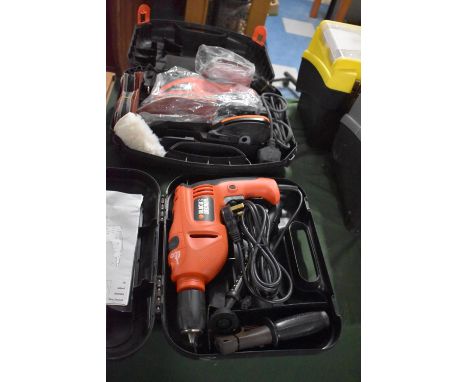 A Cased Black and Decker Electric Drill and a Sander 