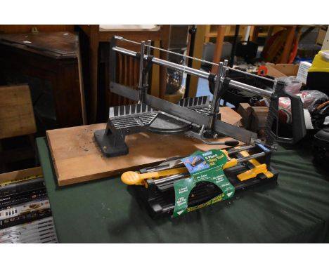 A Tiling Tool Kit, Mitre Saw and a Workbench Vice 