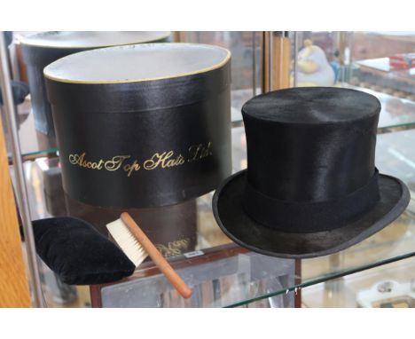 A gentleman's silk top hat, by Ascot Top Hats Ltd, internal dimensions 17 by 21cm, 60cm internal circumference at base near b