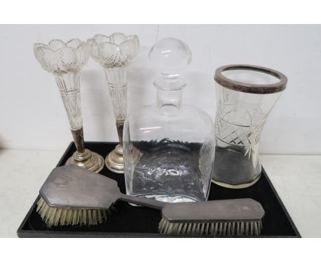 A hallmarked silver rimmed glass vase together with a pair of hallmarked silver weighted vases and two hallmarked silver back