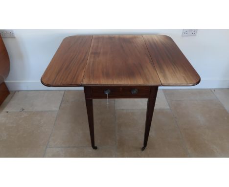 A Georgian mahogany Pembroke table, with single drawer, raised on tapered square section legs and ceramic castors, 80 by 49 b