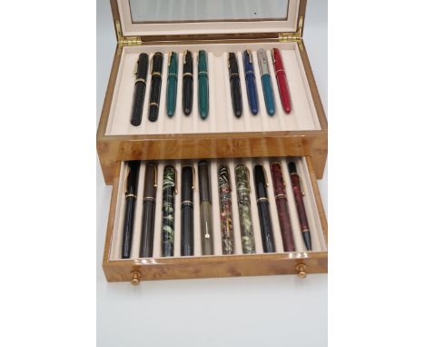 A group of eighteen vintage fountain pens, including Mentmore, Conway, Parker, Cross, Stephens, mostly with 14 and 18ct gold 