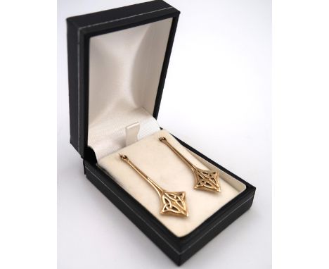 A pair of 9ct gold Celtic knot drop earrings, each approximately 42mm long, 4g total weight.