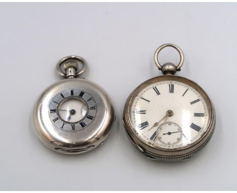 A silver Waltham pocket watch together with a Continental silver 0.935 half Hunter pocket watch - both in working order