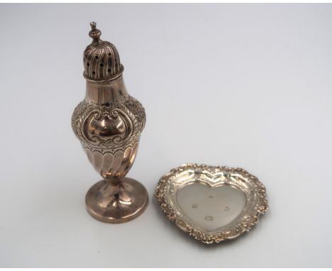 A Victorian silver pepperette, with wrythen top and belly below shoulders decorated in the recoco revival style, on pedestal 