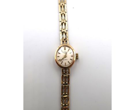 A lady's 9ct gold cased Rotary quartz cocktail watch, the signed dial with batoon numerals, with 9ct gold bracelet strap, tot