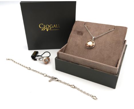 A Clogau silver, gold and mother of pearl set pendant, the central mother of pearl disc set into silver mount with gold ivy l