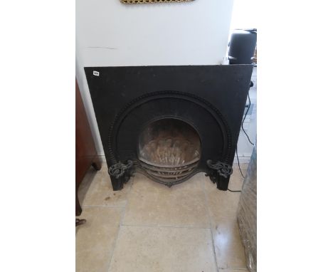 A 19th century cast iron fireplace insert with kettle holders - Height 97cm x Width 92cm