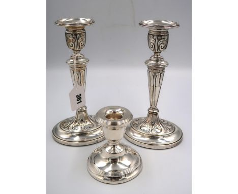 A pair of Art Nouveau silver candlesticks, of oval form with abstracted organic curvilinear decoration London 1905, makers ma