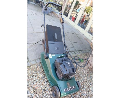 A Hayter Harrier petrol lawnmower with a rear roller - needs service