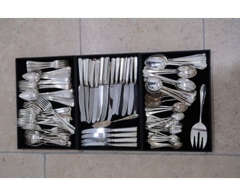 A large group of very similar silver plated cutlery with reeded decoration, comprising fourteen knives, six smaller knives an