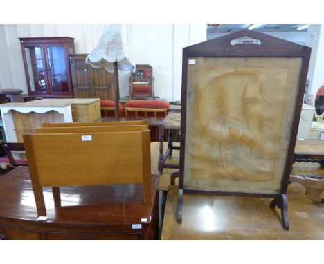 A teak magazine rack and an Arts and Crafts oak firescreen 
