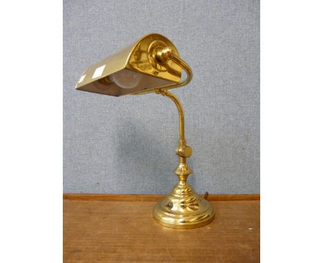 A brass student's desk lamp 