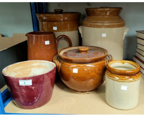 A red glazed planter with incised mark PILKINGTON; two large stoneware crocks, 35cm; 3 other pieces