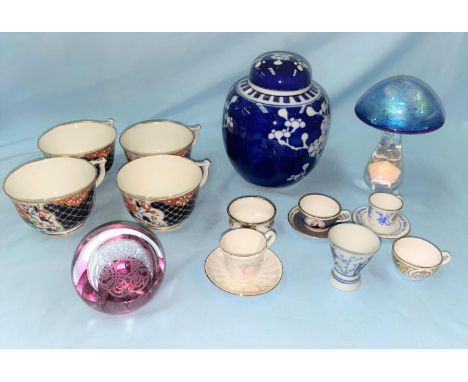 A selection of various miniature tea cups and saucers etc 