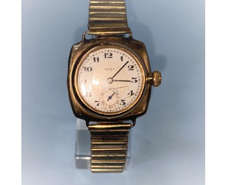 A 9ct gold cushion shaped early Rolex wristwatch, singed inside Oyster Watch Co, R.W.C LTD, 260554/1925, with white enamel di