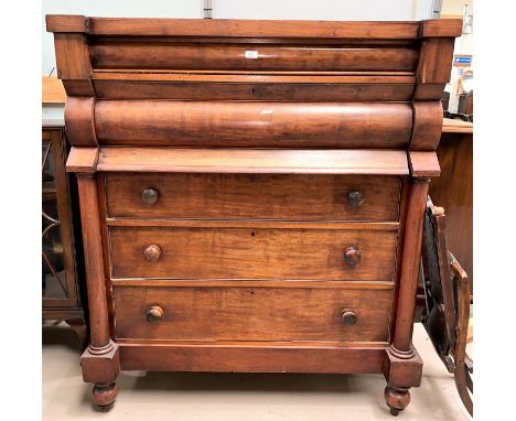 A Victorian mahogany large 'Scotch' chest of drawers with pulvinated frieze drawer, hat drawer, and 3 drawers below, with tur