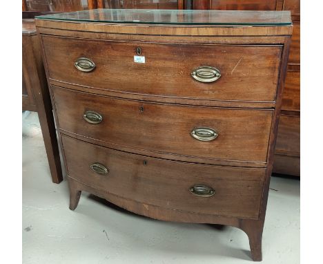 An early 19th century inlaid mahogany bow front chest of 3 drawers with brass drop handles, on bracket feet, width 92 cm 