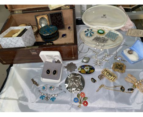 A selection of vintage costume jewellery in a  jewellery box 