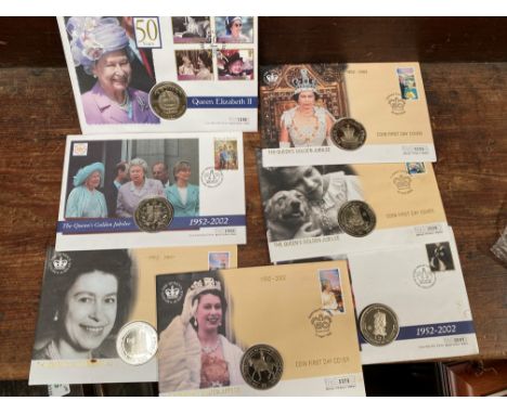 Seven QEII Golden jubilee and Commonwealth coin / stamp covers to include GB £5 and Guernsey £5 