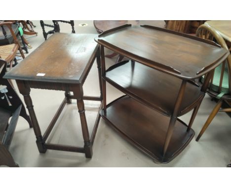 An Ercol dark oak 3 height tea trolley; a rectangular occasional table 