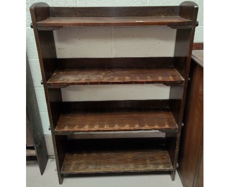 An oak Arts &amp; Crafts style bookcase containing a full set of Encyclopedia Britannica 9th edition, bound in blue and black