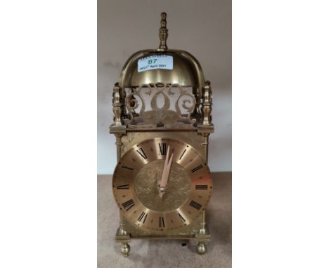 A reproduction lantern clocks with mechanical movement, height 29 cm 
