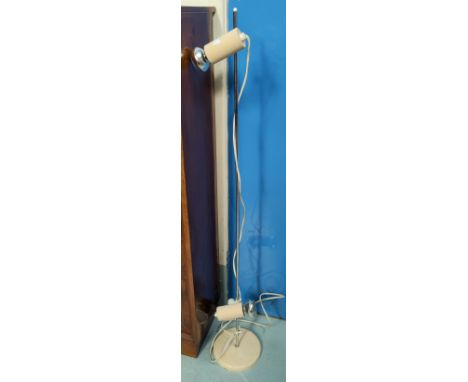 A vintage in double light standard lamp with variable light heights 