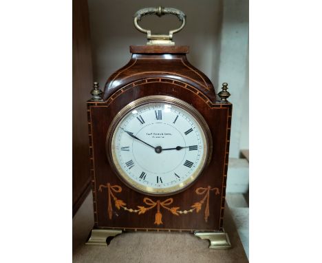 An Edwardian mantel clock in inlaid mahogany case, by Ross, Glasgow and a small selection of black and white postcards, mainl