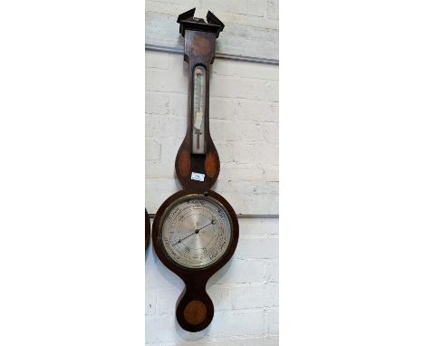 An Edwardian aneroid barometer with thermometer, in Sheraton style inlaid mahogany banjo shaped case, height 95 cm  (glass mi