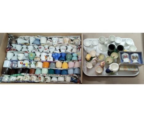 A large selection of various novelty egg cups etc 