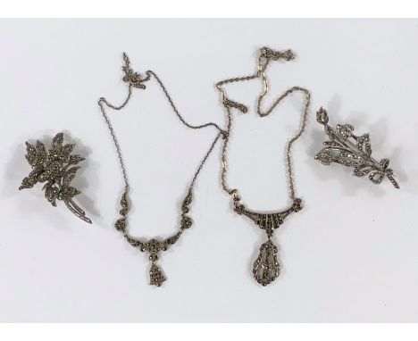 Silver marcasite set jewellery: An Art Deco necklace, another necklace &amp; 2 floral spray brooches all stamped silver 