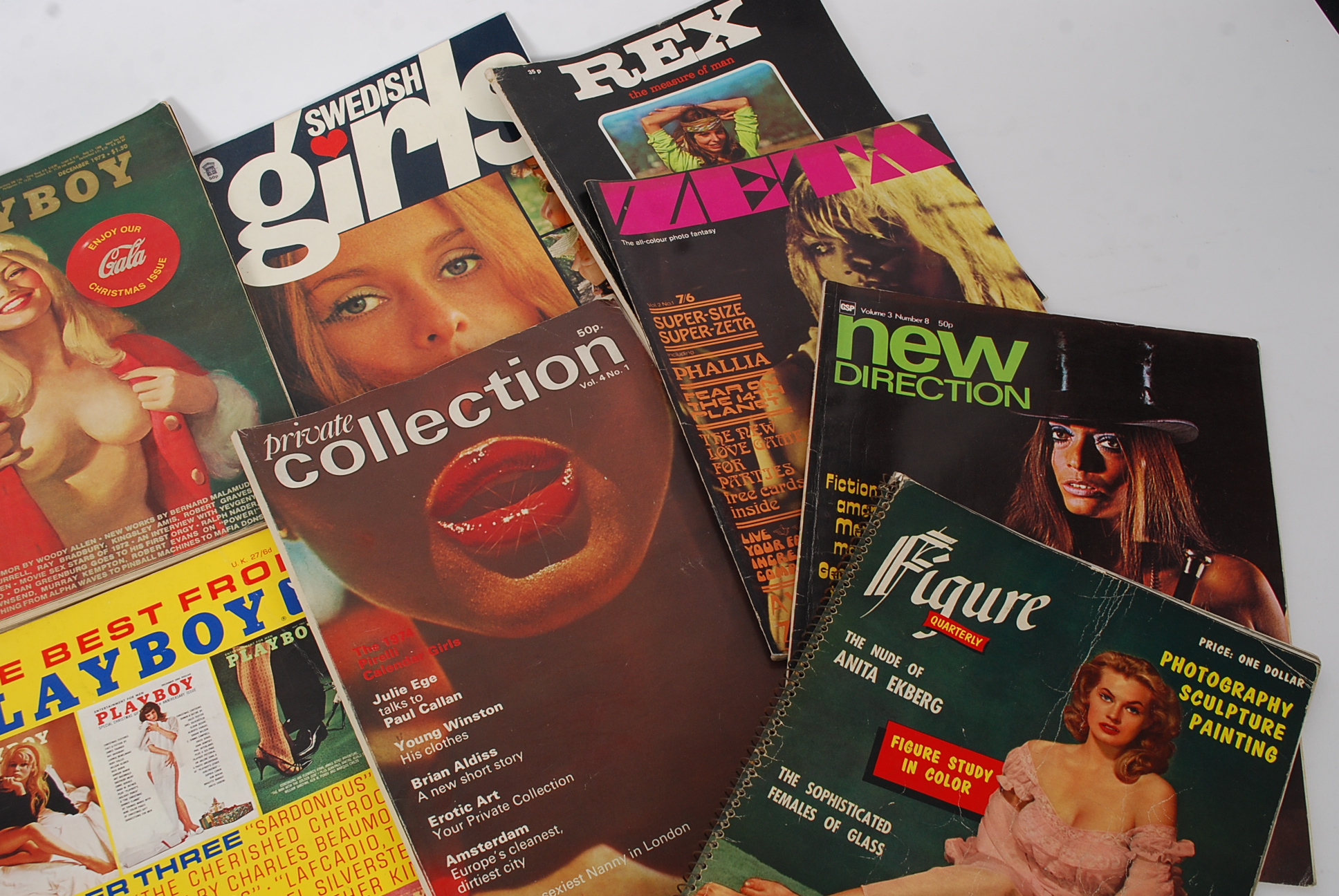 A Collection Of 20th Century Pornographic Magazines To Include Figure