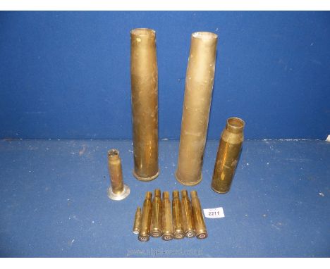 Two large ammunition shells 1944, plus some smaller ones.