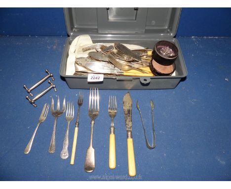 A quantity of epns cutlery including bone handled fish eaters, mother of pearl handled pickle forks, knife rests, etc.