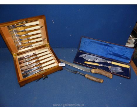 A pair of Mappin &amp; Webb fish servers, cased epns fish eaters and a carving knife &amp; fork.