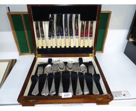 An Arthur Price vintage canteen of Cutlery for six with Firth Brearley stainless knife blades, in an oak Art Deco case, all i