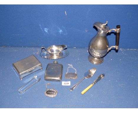 A good quality Epns Box, engine turned top on bracket feet, epns sugar tongs, plated sauce boat on stand, two white metal she