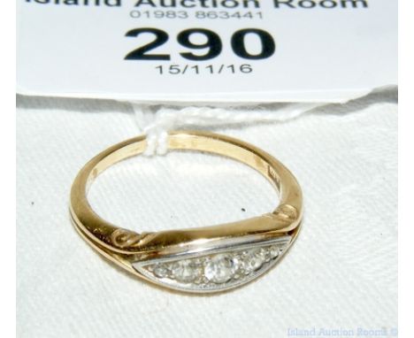 Three stone diamond ring in gold setting