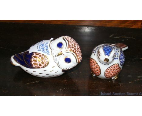 A Royal Crown Derby Owl paperweight, together with a ceramic paperweight