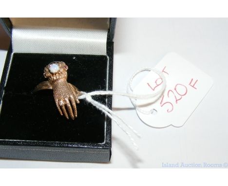 Vintage "hand" ring with opal, ruby, garnet and diamond setting