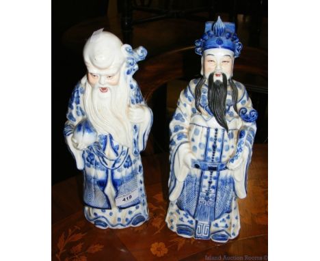 A pair of old ceramic oriental deity figures - 30cm high