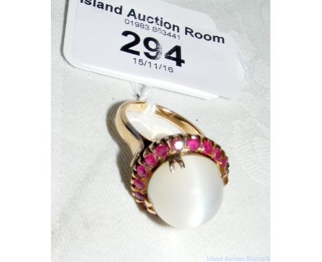 Ruby and large moonstone ring in 18ct gold setting