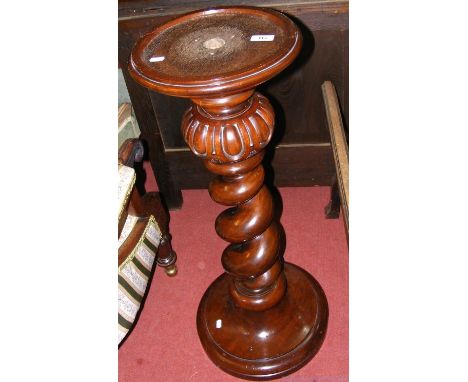 Mahogany plant stand together with a ceramic jardiniere and stand